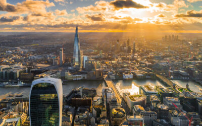 Aerial view of central London skyline at sunset, highlighting iconic buildings like The Shard and business infrastructure, symbolizing secure IT asset disposal and sustainability initiatives in the capital.
