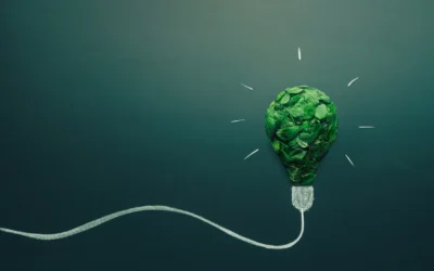 Green light bulb made of leaves symbolizing eco-friendly solutions in IT asset disposal and sustainability.