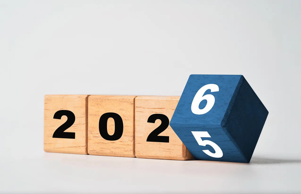Wooden blocks displaying the year 2026, with a blue block highlighting the number 6, symbolizing preparation for IT asset disposal strategies in 2026.