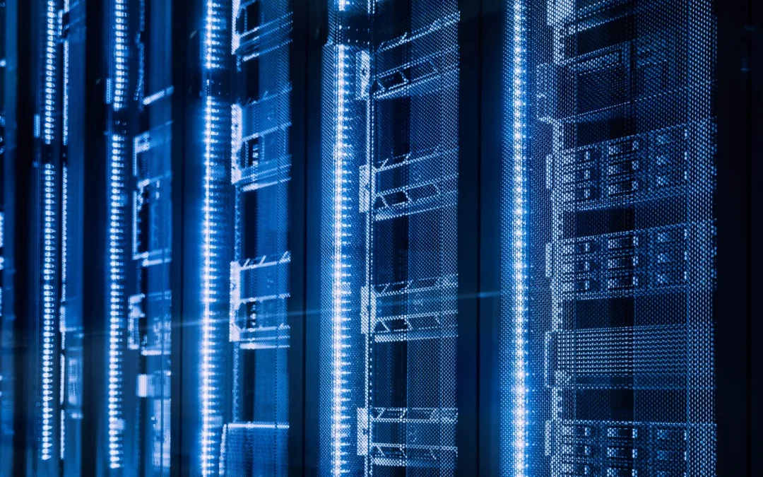 Server racks illuminated with blue lights, representing secure and compliant data storage solutions for IT asset disposal.