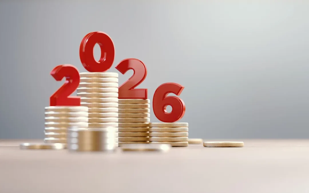 2026 figures on stacks of coins representing increased IT asset value and financial planning for 2026