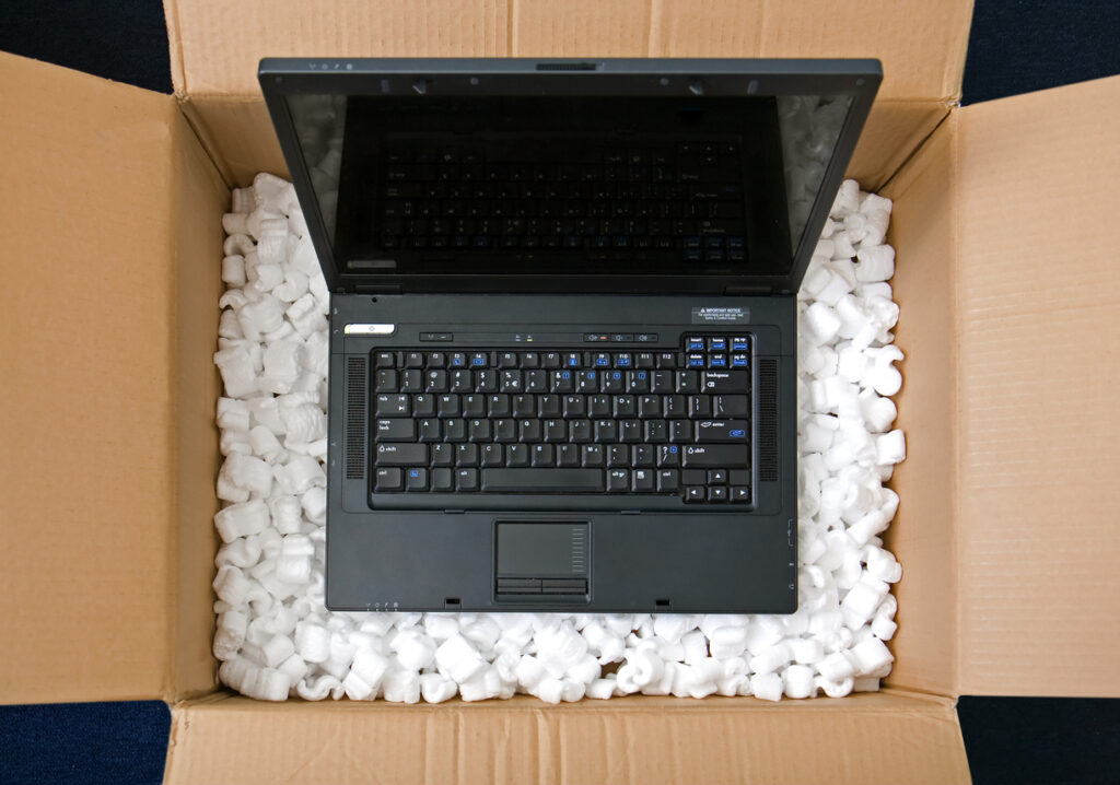 Business laptop prepared for deployment and secure delivery