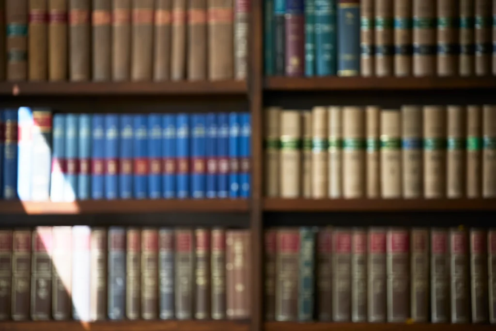 Legal reference books representing client confidentiality, governance and professional standards within a modern law firm.